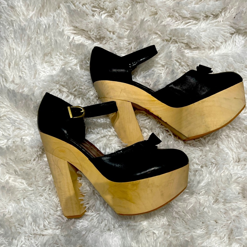 R.Y.L.A.  Belinda wood platforms .